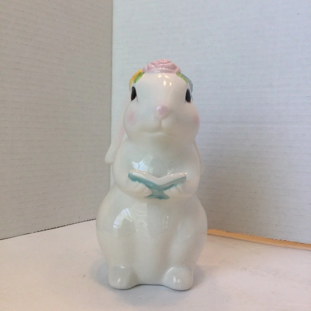 Ceramic Bunny Figurine holding book with Floral Accents